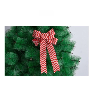 Fiocco di Natale in lino 20cm con motivo a zig-zag bianco e rosso su rami di pino