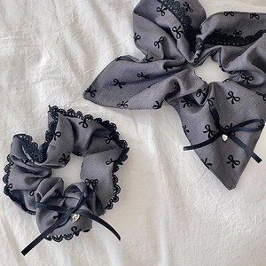 Grey fabric scrunchie set with black bow print and delicate lace trim for hair