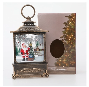 Detail of bronze Christmas lantern with Santa Claus figurine and festive gift box