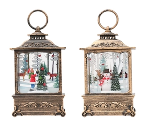 Detail of vintage bronze Christmas lanterns featuring Santa and snowman interior scenes
