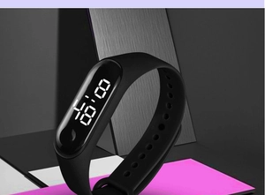 Close-up of black LED sports watch with digital display and durable silicone strap
