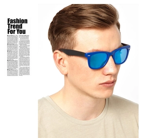Close-up of stylish Wayfarer sunglasses with blue mirrored lenses and matte black frames