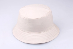 Detail of reinforced stitching on the brim of an off-white cotton bucket hat