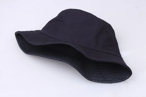Detailed top view of a classic black cotton bucket hat with a smooth twill texture