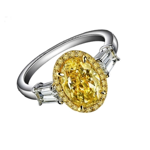 Elegant oval yellow gemstone halo ring with baguette side stones in polished silver finish