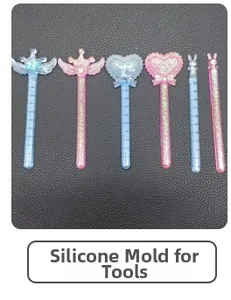 Macro detail of magic wand silicone molds with glitter stars and heart shapes
