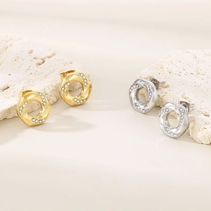 18K gold plated irregular twist hoop earrings with sparkling rhinestones on white stones