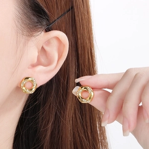 Elegant 18K gold-plated irregular hexagon stud earrings with micro-inlaid zircon stones