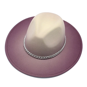 Top view of wide brim fedora hat with gold to purple gradient and silver chain decoration