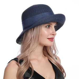 Women's navy blue straw sun hat with ribbon bow and elegant rolled edge brim