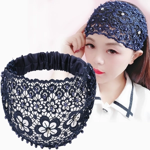 Dark blue floral lace headband with pearls and rhinestones on elastic satin band