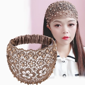 Brown lace wide headband with pearls and rhinestones, showing model wearing effect