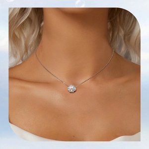 Model wearing a shell-shaped s925 silver necklace with blue opal and sparkling stones