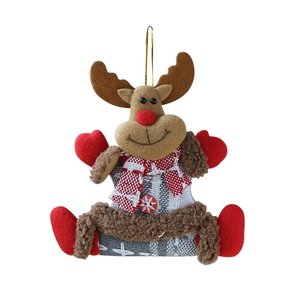 Hanging Christmas reindeer plush ornament with red and brown plaid knit details