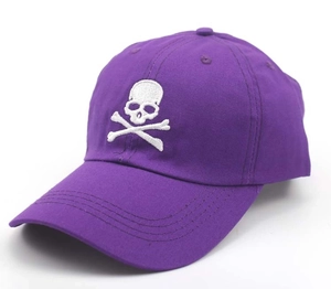 Detailed embroidery of a white skull and crossbones on a purple casual baseball cap