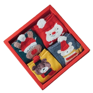 Christmas gift box with four pairs of festive cartoon cotton socks for women in red packaging