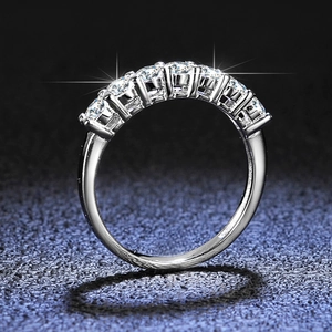 Classic S925 sterling silver row ring featuring seven brilliant moissanite stones