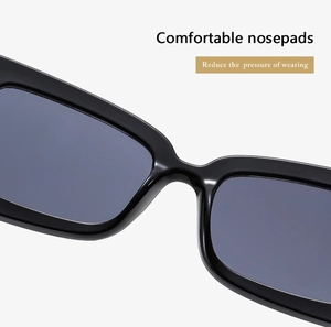 Close-up of integrated comfortable nose pads on black rectangular sunglasses