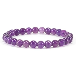Close-up of 6mm natural purple crystal beads on an elastic string bracelet