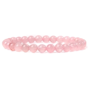 Detailed close-up of 6mm pink natural crystal beaded elastic bracelet with translucent beads