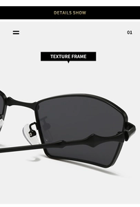 Detail of black metal sunglasses featuring unique bamboo-style temples and textured frame