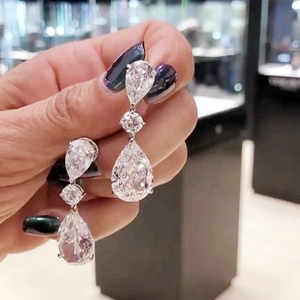 Exquisite teardrop cubic zirconia earrings with pear-cut stones in a silver-tone setting