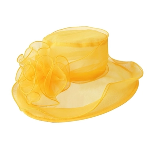 Detail of elegant yellow organza sun hat featuring a large decorative floral applique