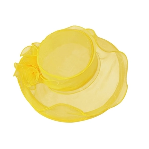 Detail of yellow organza sun hat featuring an elegant fabric floral appliqué on side
