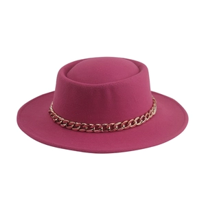 Classic rose red wool felt boater hat with a chunky gold chain band on white background