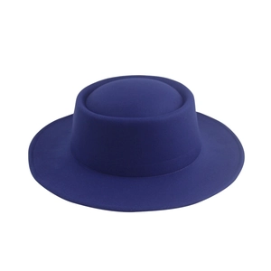 Detailed view of the wide brim and dark blue wool felt texture of the fedora hat