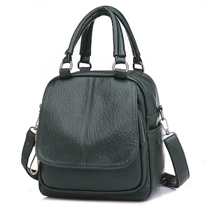Deep green versatile multi-zipper handbag and shoulder bag in premium faux leather