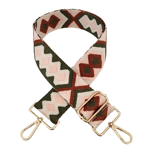 Detail of adjustable colorful bohemian diamond pattern wide canvas strap with gold hooks