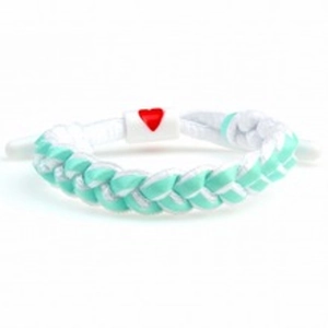 Detail of white and mint green braided bracelet with white square heart clasp