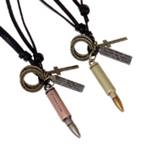 Detailed shot of bullet pendants on leather cords with engraved metal nameplates