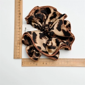 Double-layer leopard print hair scrunchie with silk texture and brown overlocked edge