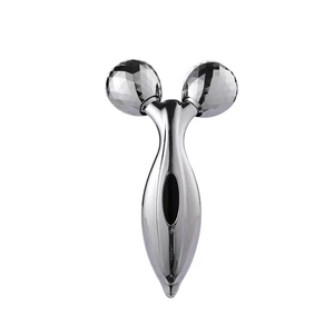 3D roller face massager with silver chrome finish for facial lifting on white background