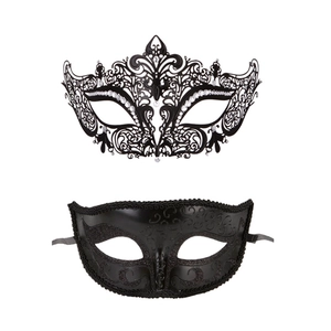 Set of black filigree metal Venetian masks with intricate rhinestones and embossed patterns