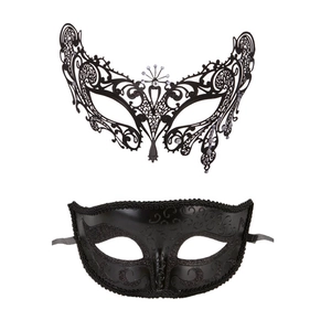Detail of laser-cut black metal filigree mask with rhinestones and glitter finish