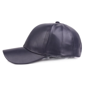 Side view of solid color PU leather baseball cap with smooth lines and curved brim