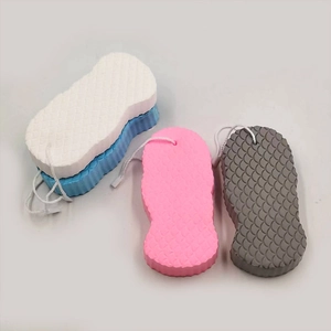 Detail of 3D bath sponges with fish scale texture in white blue pink and grey colors