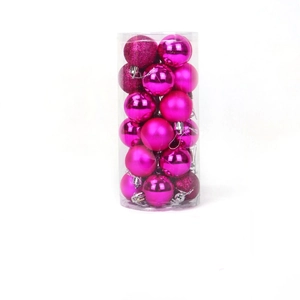 Close-up of rose red Christmas balls in glossy and matte textures in a clear tube