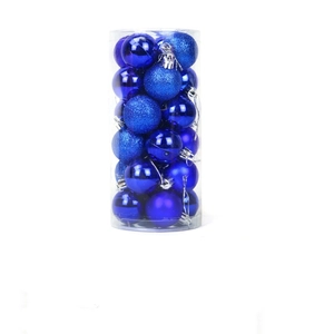 Deep blue Christmas ball ornaments set with matte, glossy, and glitter textures in a tube