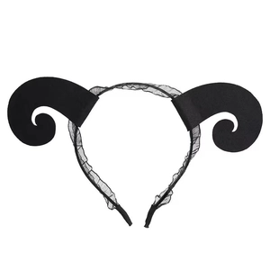 Macro detail of black devil horn headband with intricate lace trim for Halloween costume