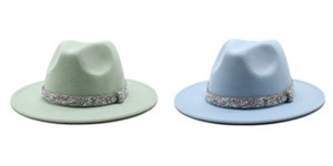 Detail of mint green and light blue wool fedora hats with silver sequin band decoration