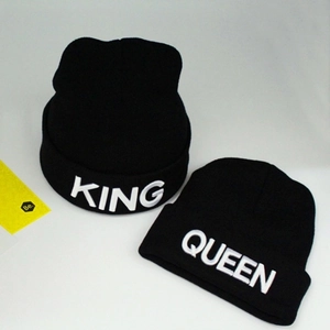 Pair of black beanies with white KING and QUEEN 3D embroidery on fold-over cuffs
