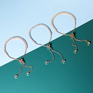 Detailed close-up of adjustable bracelets in rose gold, silver, and gold with 3mm zircons