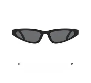 Close-up of sleek black cat eye sunglasses featuring stylish studded temples and dark lenses