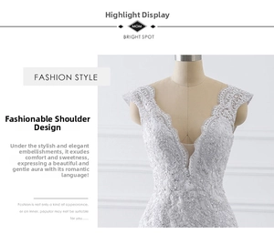 Detailed view of white mermaid wedding dress with lace embroidery and sequin V-neckline