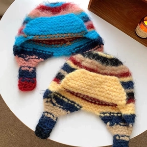 Women's color block knit trapper hat with soft mohair texture and warm earflaps