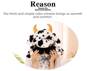 Detail of plush cow hat featuring realistic 3D horns and soft black and white cow print